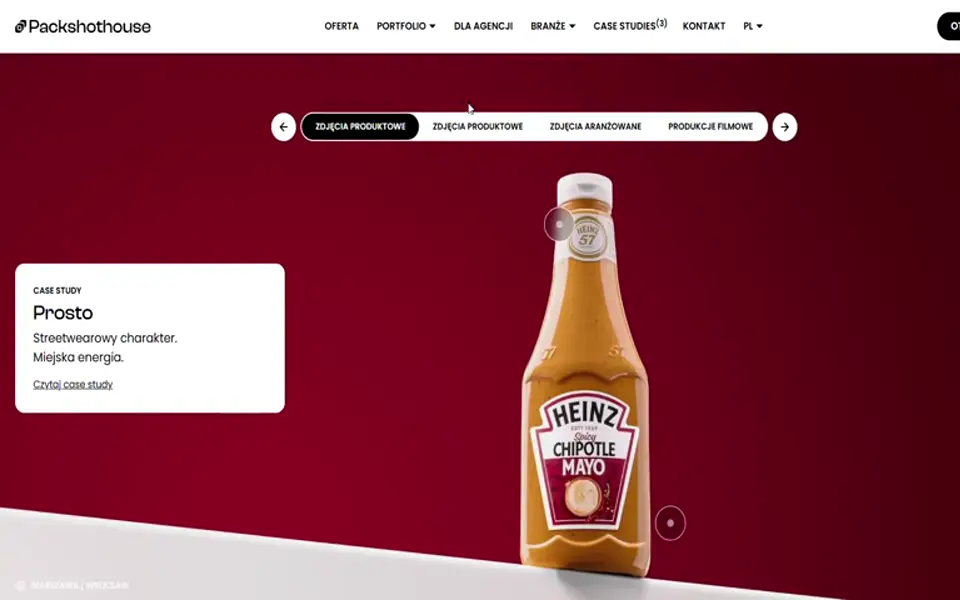Strona Packshothouse: pełnoekranowy kadr z realizacji i przełącznik kategorii portfolio